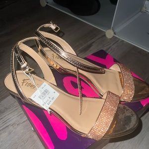 Rose gold kitten heels. Never worn. New in original box